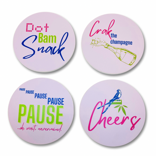 Set of four acrylic coasters for Mahjong. Design includes Bird Bam Cheers, Dot Bam Snack, Pause Pause Pause Pause Pause, and Crak the Champagne!